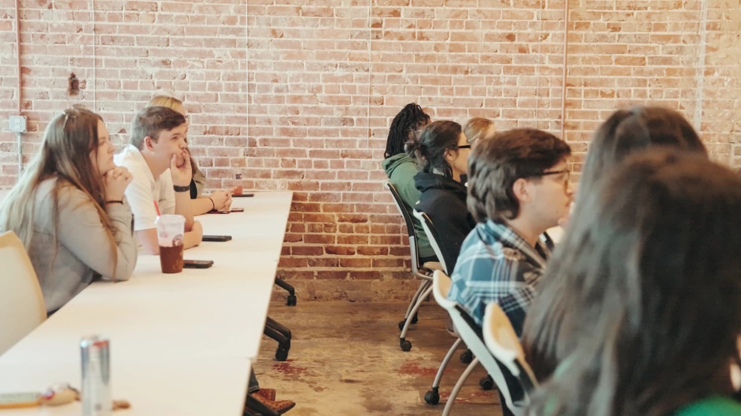 People gathered for an Arkansas Tech University event at Co-Create